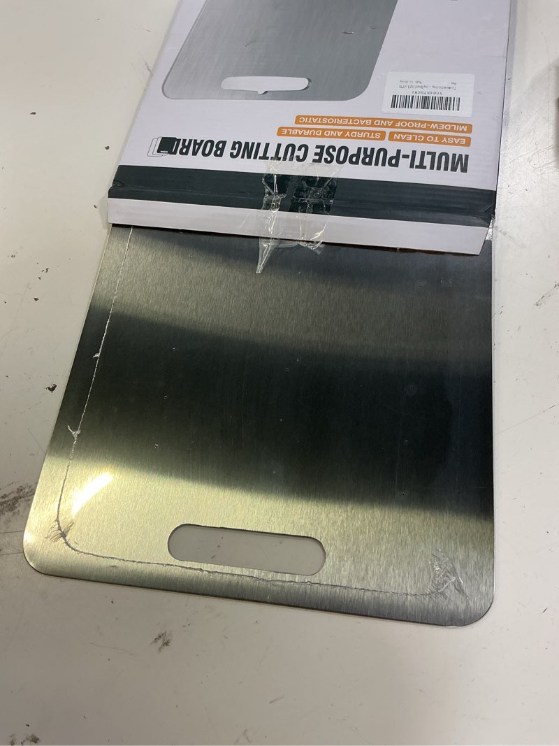 Condition photo showing Good Condition for titanium cutting board - 2026 new upgrade 100% pure titanium cutting boards for kitchen double sided non toxic titanware cutting board,hygiene durable dishwasher safe chopping board (12"l x 9"w)
