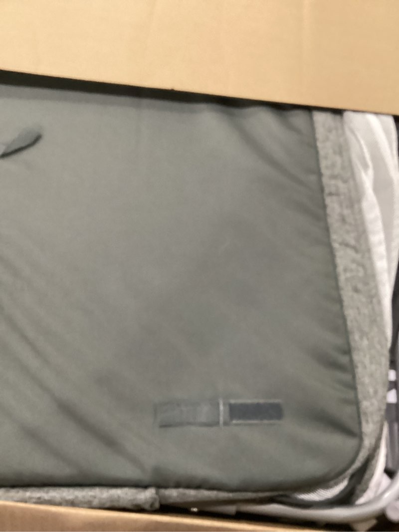 Condition photo showing As Is for delta children simmons kids dream bedside bassinet with zip-down side wall – convenient baby sleeper with breathable mesh and adjustable heights - lightweight portable crib, grey