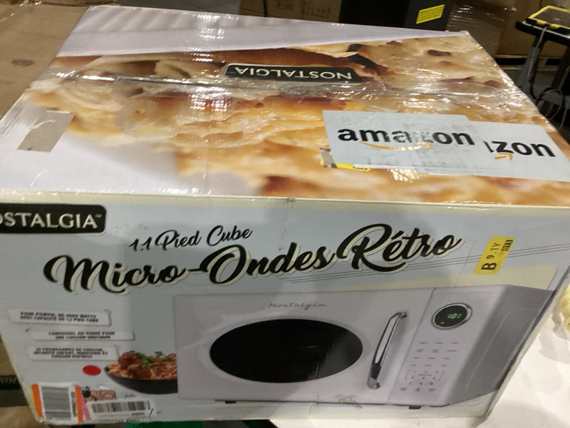 Condition photo showing As Is for Emerson MW7302W Compact Countertop Microwave Oven with Touch Control, LED Display, 700W, 10 Power Levels, 6 Auto Menus, Glass Turntable and Child Safe Lock, 0.7 Cu., Ft. White