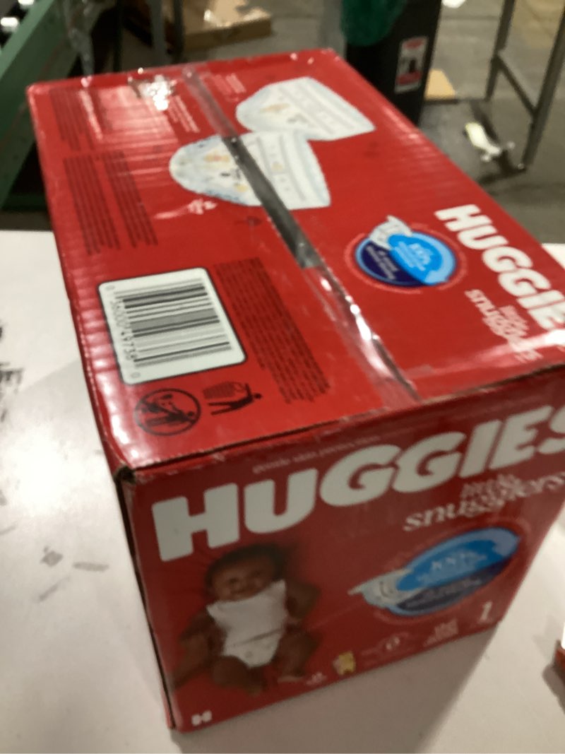 Condition photo showing New/Like New for Huggies Size 1 Diapers, Little Snugglers Baby Diapers, Size 1 (8-14 lbs), 96 Count, Packaging May Vary