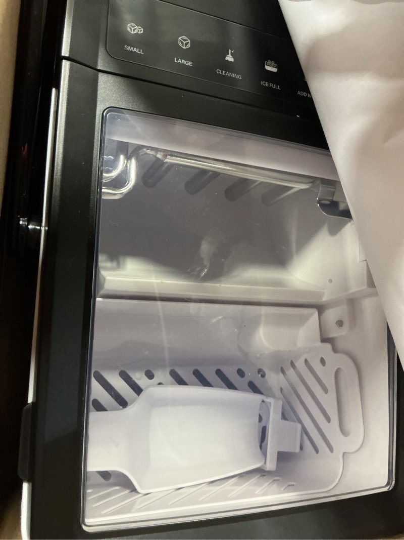 Condition photo showing Good Condition for igloo premium self-cleaning countertop ice maker machine, handled portable ice maker, produces 26 lbs. in 24 hrs. with ice cubes ready in 6-8 minutes, comes with ice scoop and basket black 26 lb handle