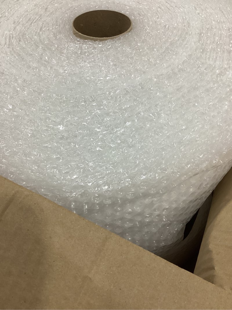 Condition photo showing New/Like New for Amazon Basics Bubble Wrap for Moving, Packing, Shipping and Storage, Perforated Protective Cushioning for Fragile Items, 12-inch x 175-ft Long Roll, Small 3/16", Clear Clear 12 inch x 175 ft