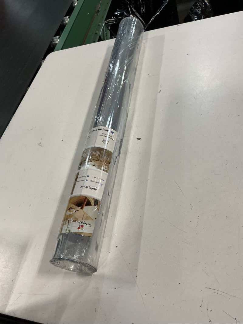 Condition photo showing New/Like New for ostepdecor clear table protector 25 x 48 inch, 2mm thick plastic table cover, waterproof pvc clear table cover protector, desk protector mat, writing desk pad for desktop, coffee & dining room table 25" x 48" (rectangular) crystal clear 2mm