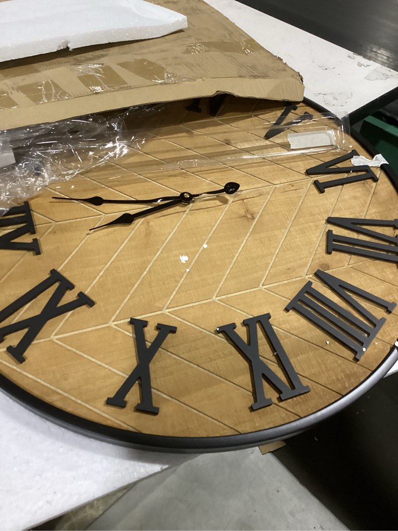 Condition photo showing As Is for kenning farmhouse wall clock for living room decor, rustic 24'' wall clock | large decorative wall clock with brown wooden face & black metal frame, silent battery operated for kitchen bedroom entryway herringbone 24 inch brown