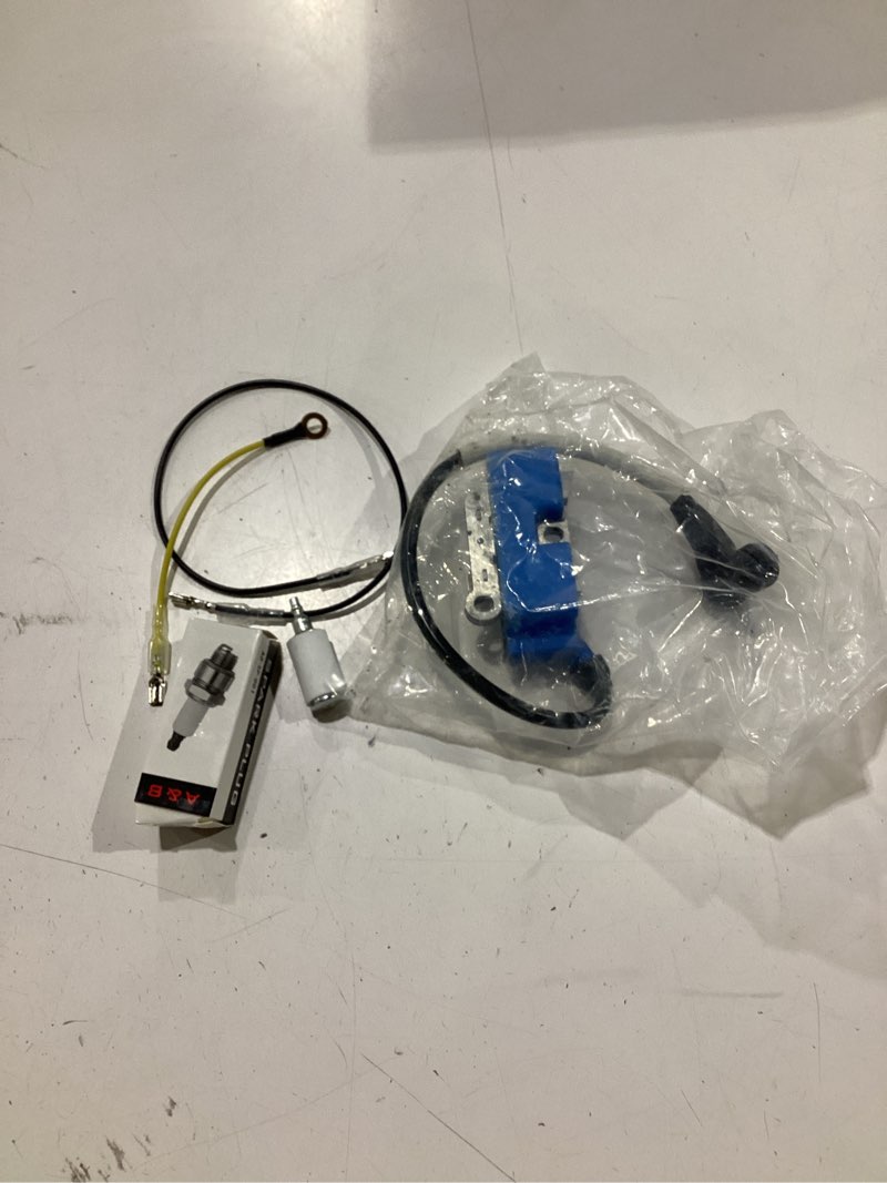 Condition photo showing Good Condition for 510115703 ignition coil with spark plug for husqvarna 365 371 570 362xp 371epa 570xp 575xp epa cs2163 cs2165 cs2171 replaces 537277401 504714601 544047201 510115704 510115701 537277401