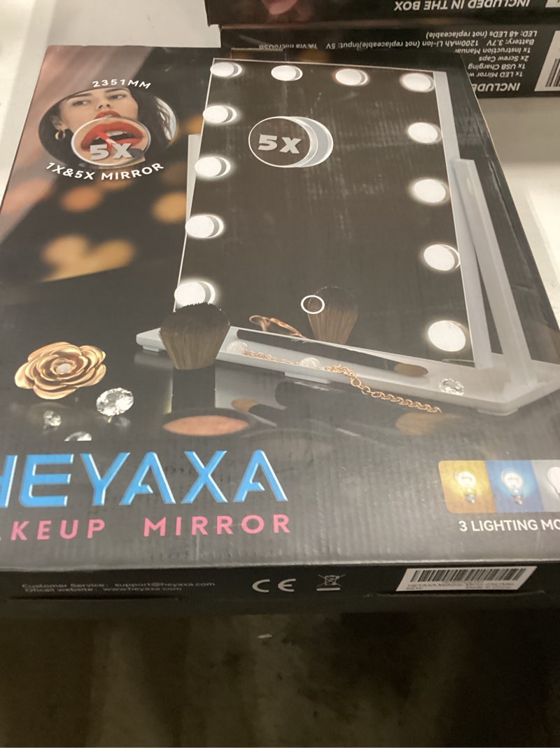 Condition photo showing As Is for heyaxa vanity mirror with lights, makeup mirror with 12 dimmable bulbs 3 color lighting modes detachable 5x magnification mirror,360°rotation, white.
