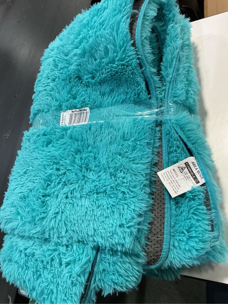 Condition photo showing As Is for junovo Soft Area Rugs for Living Room 5x8 Feet Fluffy Rug Carpets for Bedroom Shaggy Rugs for Kids Teens Girls Boys Indoor Plush Rug for Dorm Room Playroom Nursery Home Decor, Turquoise Blue