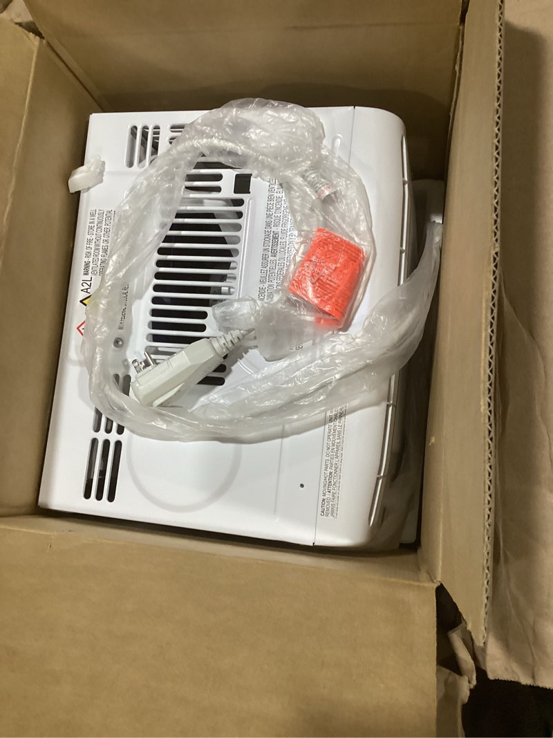 Condition photo showing Good Condition for frigidaire 5,000 btu window-mounted air conditioner, cools up to 150 sq. ft., quiet operation, effortless temperature control, 2 fan speeds, auto restart, white 5,000 btu mechanical controls