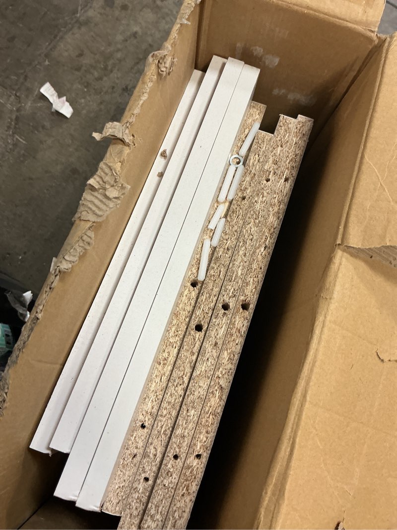 Condition photo showing As Is for mainstays 9-cube storage shelf