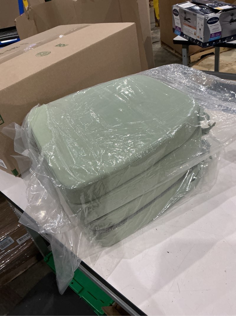 Condition photo showing Good Condition for green square outdoor waterproof seat cushion with non-slip backing 4-pack
