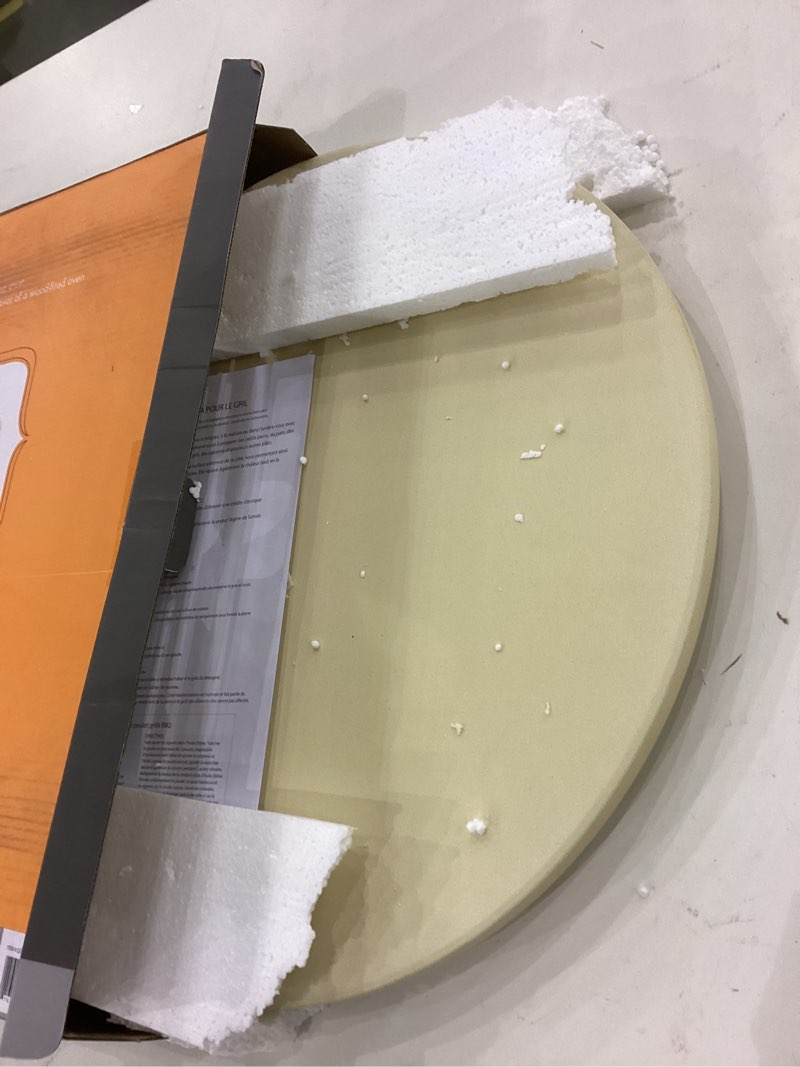 Condition photo showing New/Like New for Outset 16.5 Inch Pizza Grill Stone, 16.5-Inch,Pizza Grill Stone: 16.5-Inch 16.5-Inch Round Pizza Stone