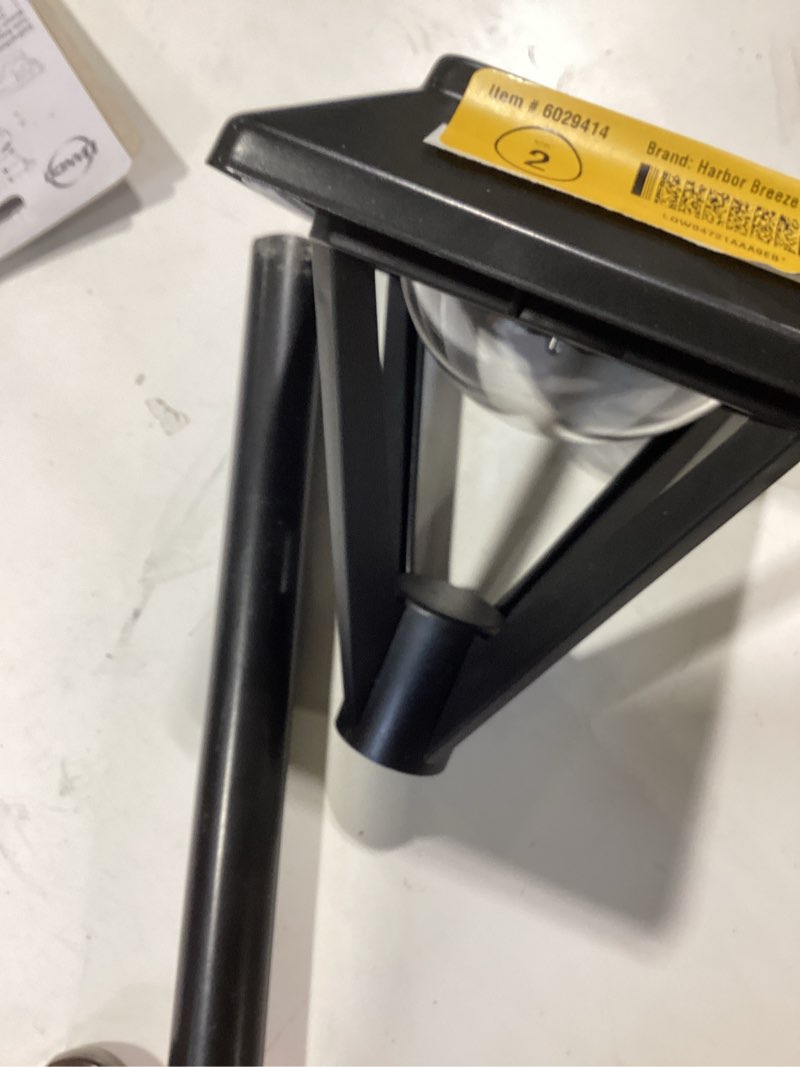 Condition photo showing As Is for harbor breeze pyramid path 20 -lumens black solar led outdoor path light ( 3300-k )