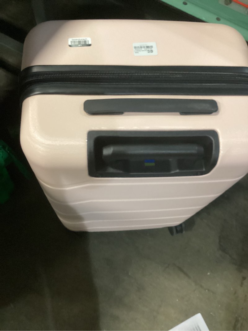 Condition photo showing As Is for pink luggage