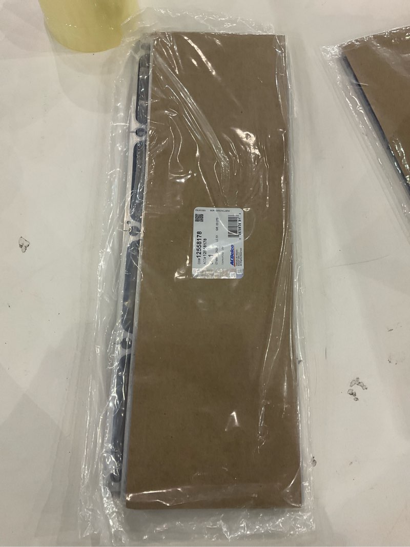 Condition photo showing New/Like New for ACDelco 12558178 Valley Pan Gasket