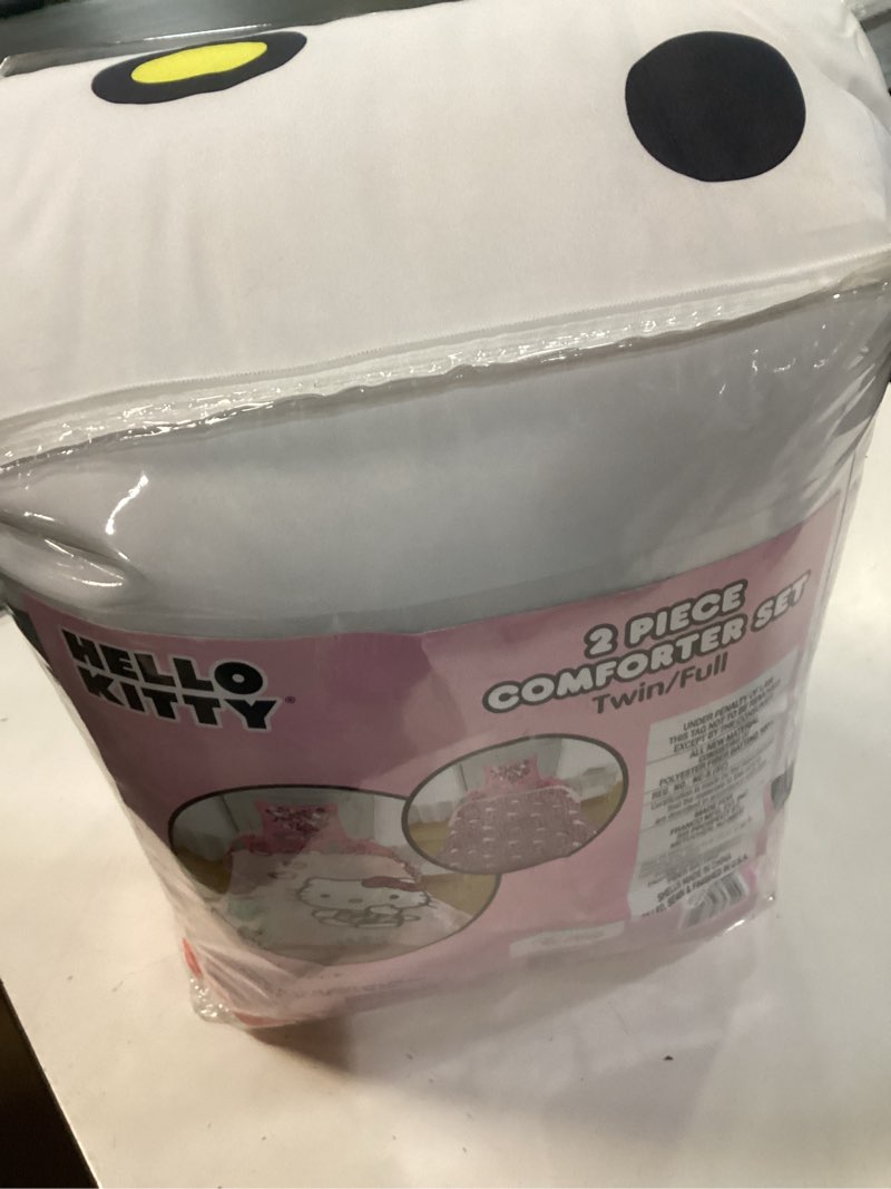 Condition photo showing New/Like New for hello kitty kids 2 piece pink reversible comforter and pillowcase set, twin/full