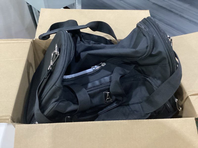 Condition photo showing Good Condition for used travelpro maxlite 5 carry on weekender with drop-bottom compartment, lightweight overnight travel duffel bag black