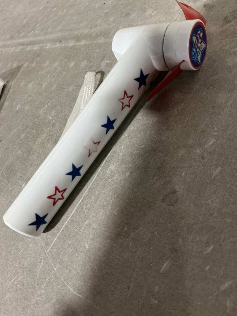 Condition photo showing Good Condition for small handheld fan featuring patriotic red, white, and blue star decorations.   