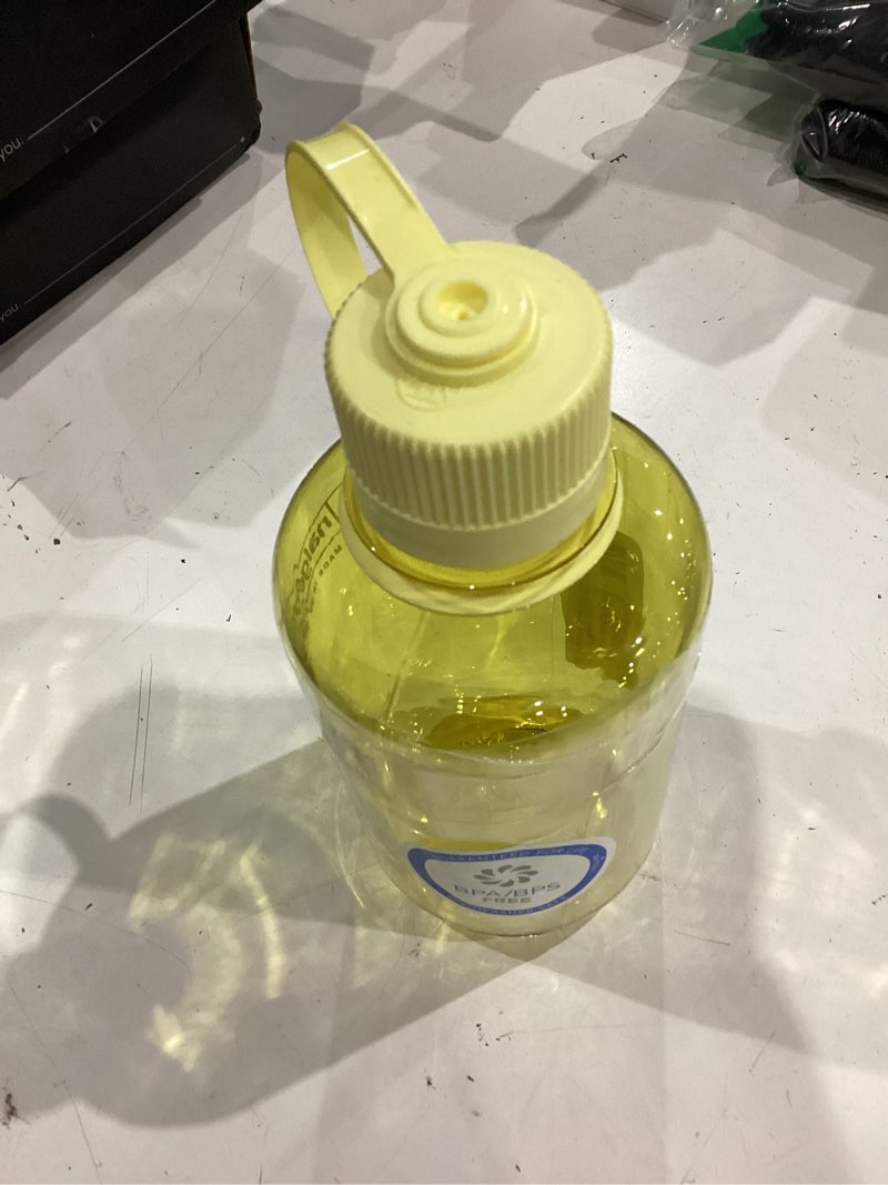 Condition photo showing As Is for nalgene 16 oz narrow mouth water bottle | slim cup holder size, bpa-free, durable & leak proof, lightweight travel bottle, butter butter 16 ounces