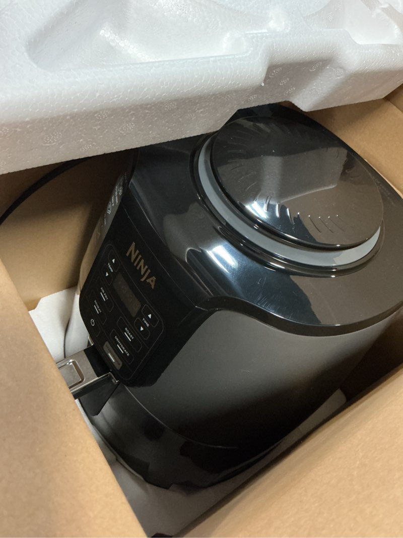 Condition photo showing As Is for ninja air fryer | 4 qt capacity | 4-in-1 roast, crisp, roast, reheats, & dehydrates | dishwasher safe parts | 105°f-400°f | includes 20 easy & healthy recipes | 1550 watt | grey | af101