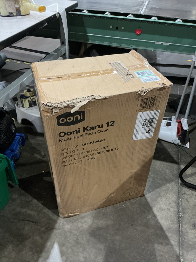 Condition photo showing New/Like New for ooni karu 12 multi-fuel outdoor pizza oven – 12 inch pizzas in 60 seconds - portable wood and gas fired pizza oven with pizza stone, dual fuel ooni pizza oven