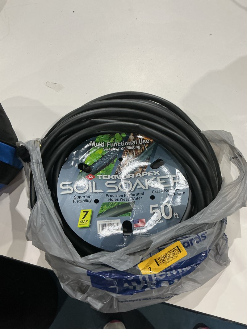 Condition photo showing As Is for teknor apex soil soaker 3/8-in x 50-ft vinyl black coiled hose