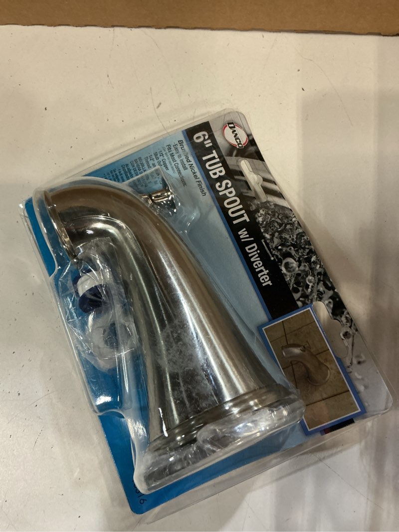 Condition photo showing Good Condition for 5-1/2 in. decorative tub spout in brushed nickel