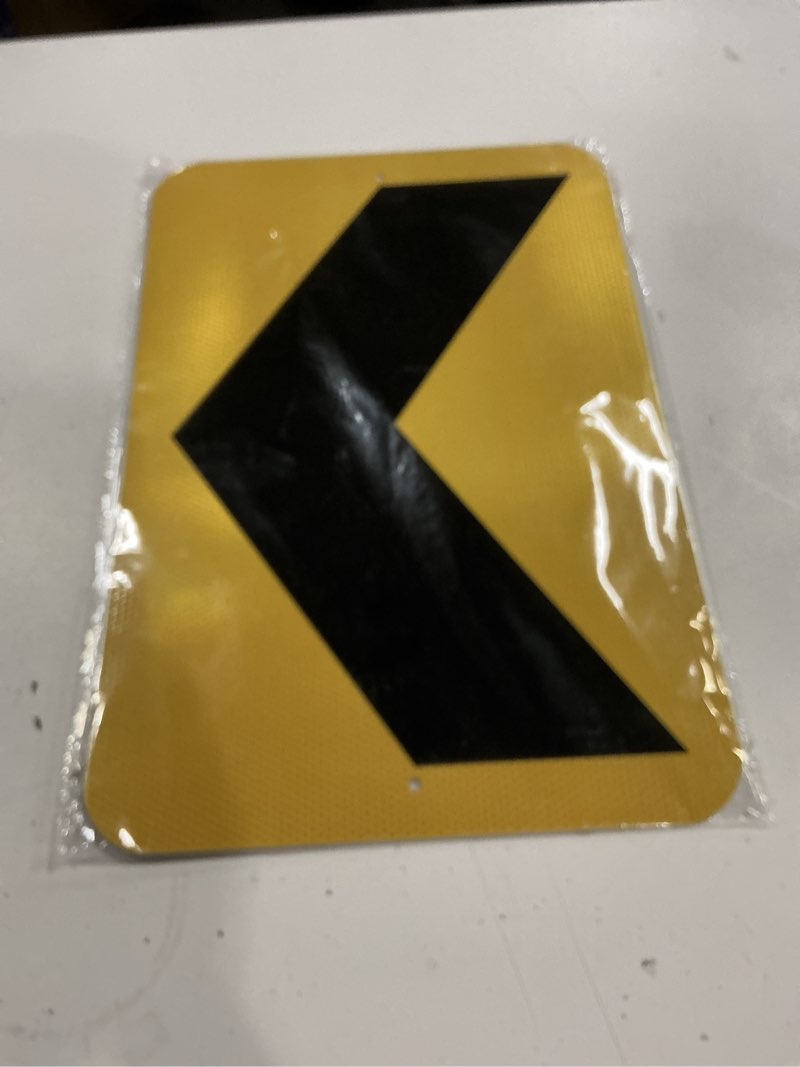 Condition photo showing As Is for 2 pack chevron arrow sign 18 × 12 inch engineer-grade reflective aluminum waterproof rust-free metal left arrow sign with pre-drilled holes for road driveway outdoor black,yellow 18\" × 12\" left arrow (1 only)