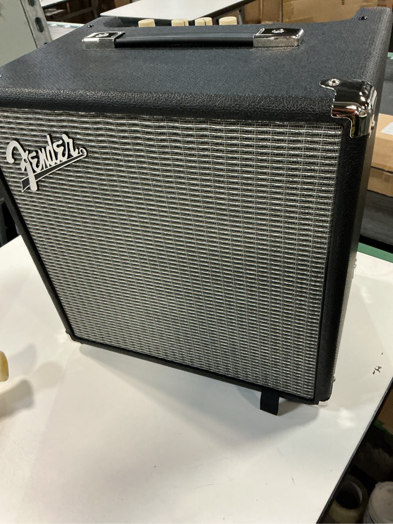 Condition photo showing As Is for Fender Rumble 25 (V3) Bass Amplifier with 8" Speaker Bundle with Fender Joe Strummer Instrument Cable (13ft) Straight/Straight, Drab Green