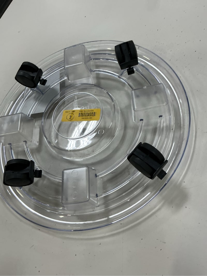 Condition photo showing As Is for style selections 16-in l x 16-in d x 3.34-in h clear plant caddy