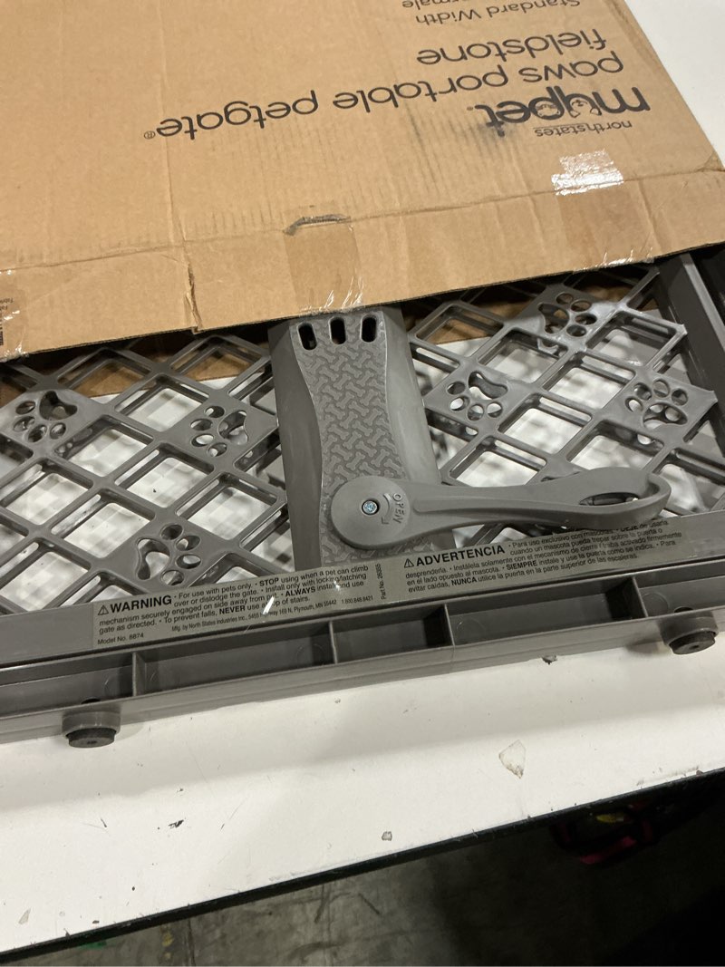 Condition photo showing New/Like New for mypet north states paws portable pet gate: 26-40" wide. pressure mount. no tools needed. made in usa, 23" tall, expandable, durable dog gates for doorways, fieldstone gray