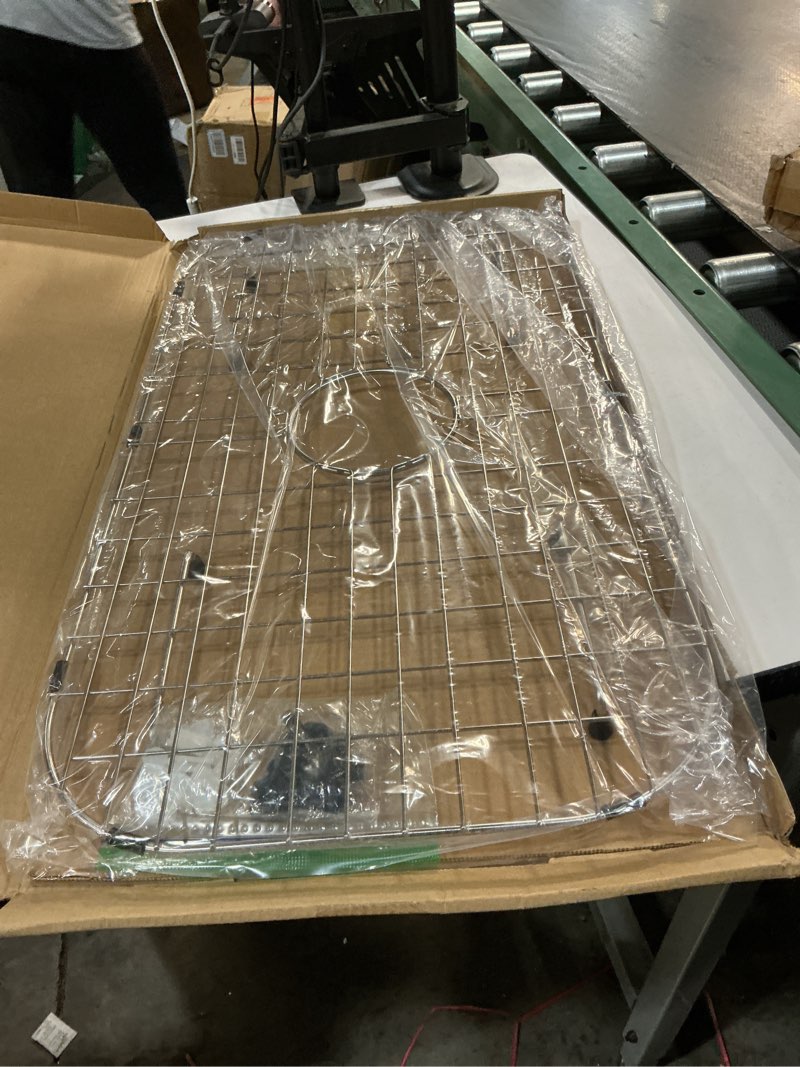 Condition photo showing Good Condition for sink protector grid 26-1/16" x 14-1/16", centered drain with corner radius 3-1/2", 304 stainless steel material (centered drain) for single bowl kitchen sink 26-1/16" x 14-1/16" centered drain