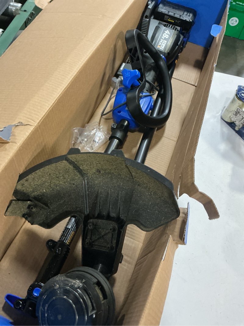 Condition photo showing As Is for kobalt cordless string trimmer