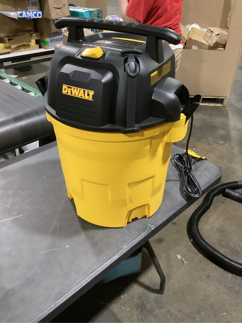 Condition photo showing As Is for dewalt stealthsonic quiet 12-gallon 5.5 hp corded wet/dry shop vacuum with accessories