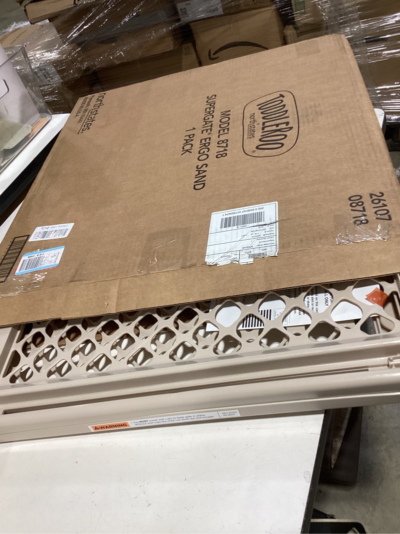 Condition photo showing New/Like New for toddleroo by north states - supergate ergo baby gate: plastic baby gate for stairs & doorways - adjustable indoor safety gate - made in usa - 26 to 42 inches wide - 26 inches tall - sand