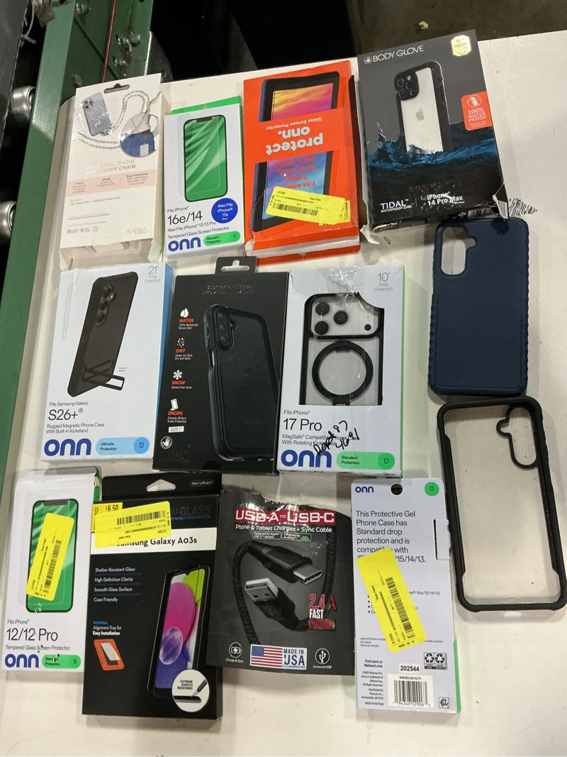 Condition photo showing As Is for assorted lot of electronics (may includes phone cases, small gadgets, headsets, etc.). please see pictures taken (bidfta image) to determine items that will be received