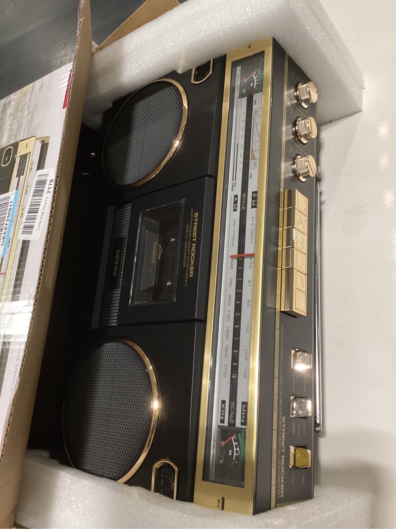 Condition photo showing New/Like New for ion audio 1980s-style portable bluetooth boombox am/fm radio cassette player recorder, vu meters, usb recording, dual full-range high bass speakers (gold edition)