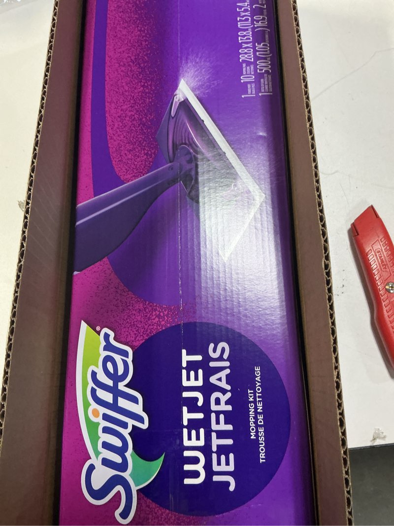 Condition photo showing New/Like New for swiffer wetjet hardwood and floor spray mop cleaner starter kit, includes: 1 power mop, 10 pads, cleaning solution, batteries