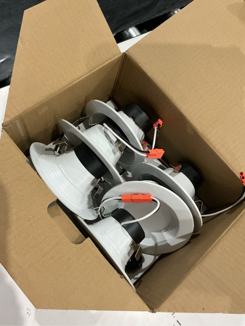 Condition photo showing As Is for utilitech white 4-in 600 -lumens switchable white round dimmable led wet rated recessed