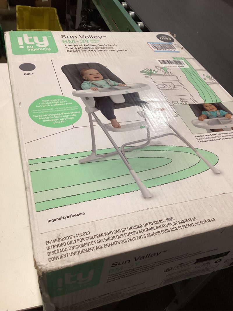 Condition photo showing New/Like New for Ingenuity: ity by Ingenuity Sun Valley Compact Folding High Chair, Food-Grade Safe Plate, Safety Harness, for Ages 6 Months and Up, Unisex - Grey Sun Valley Grey