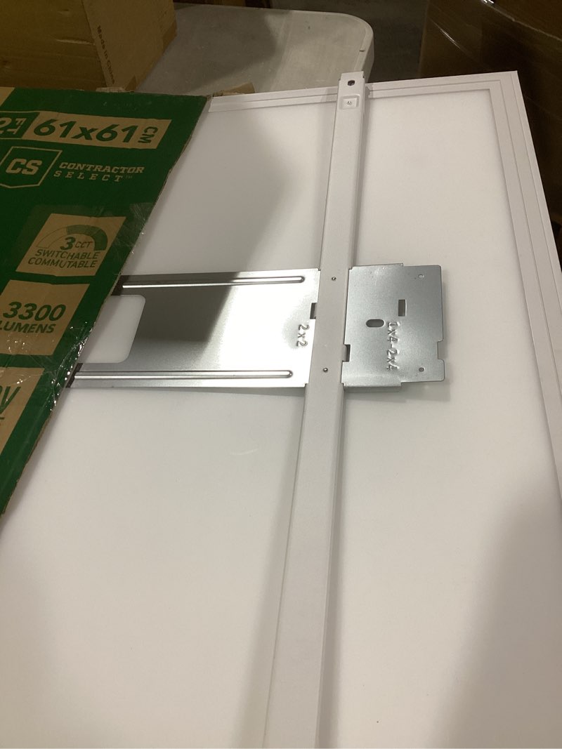 Condition photo showing As Is for lithonia lighting cpanl 2x2 33lm sww7 120 td dcmk 2 ft. x 2 ft. ll cpanl led flat panel with 3300 lumens and 3500 to 5000k switchable cct with direct ceiling mount bracket