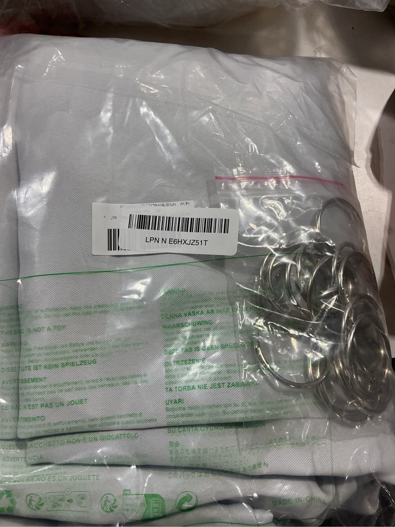 Condition photo showing Good Condition for nicetown blackout curtain liners for sheer curtains, cold heat light noise blocking liners with rings: easy to open and closed, thermal liners for 84 inches long curtains, 1 pair, 50" x 80" per panel 50"w x 80"l (pack of 2) platinum white