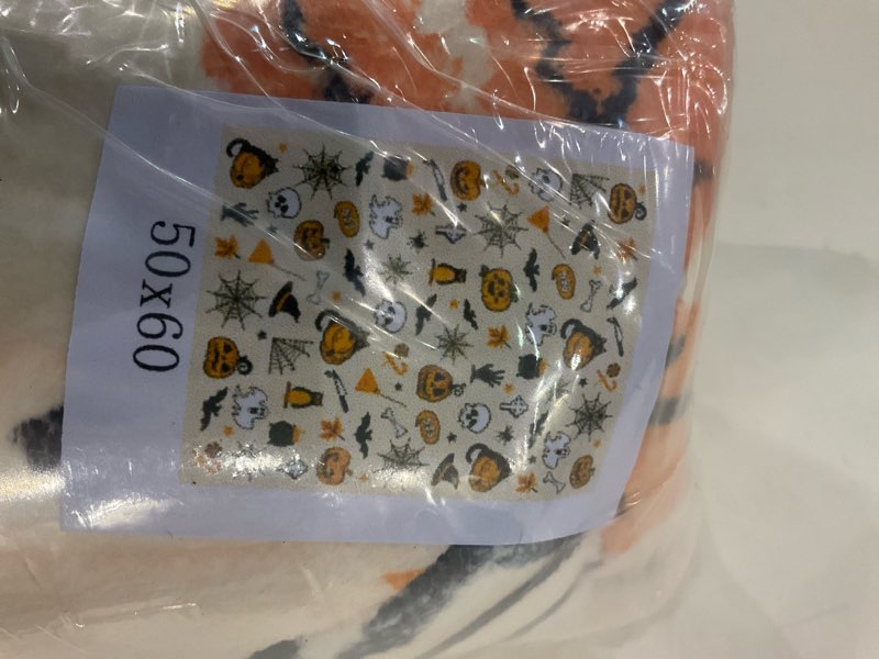 Condition photo showing New/Like New for Halloween Blanket-Pumpkin, Spiderweb Print, Size 60x50”