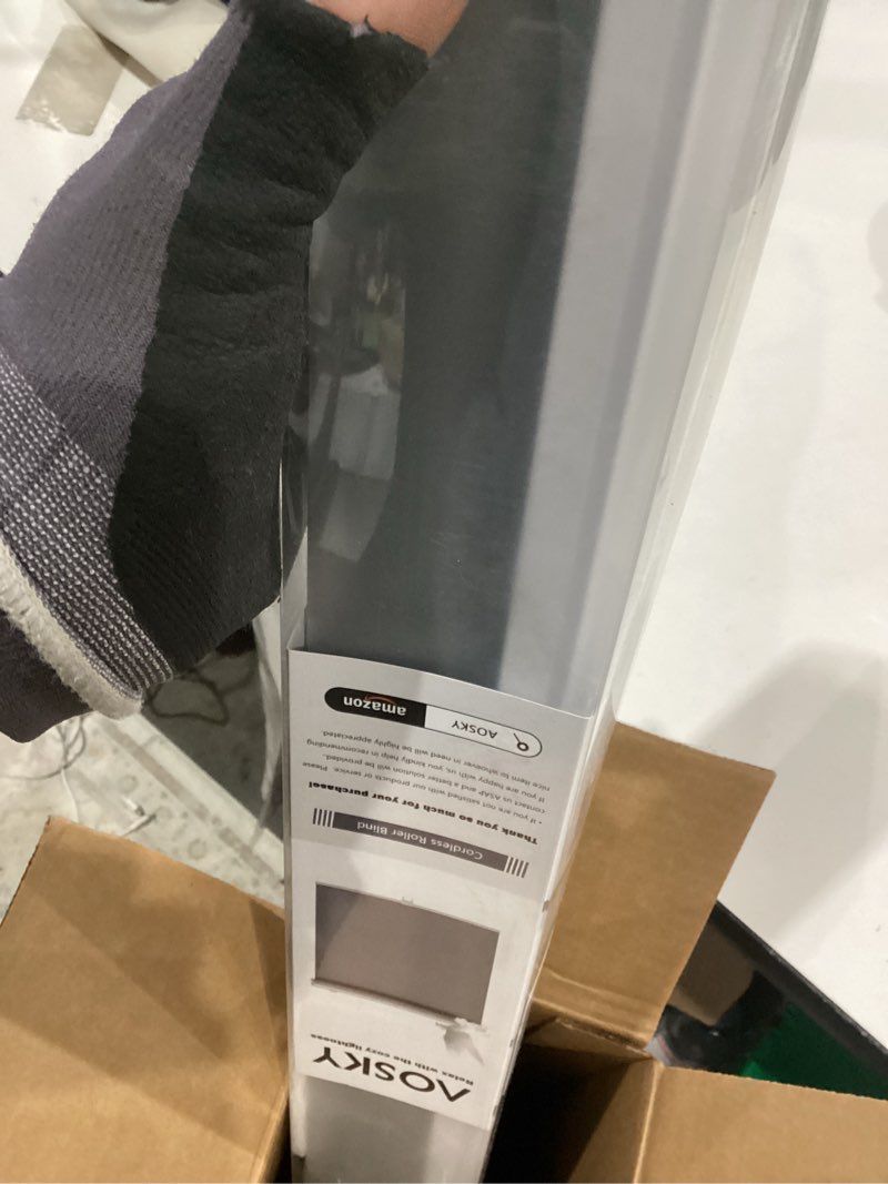 Condition photo showing As Is for AOSKY Cordless Roller Shades Blackout Blinds for Windows Room Darkening Rolled Up Shades with Spring System, UV Protection Window Shades Door Blinds for Home and Office (25" W x 72" H, Black) 25"W x 72"H Black