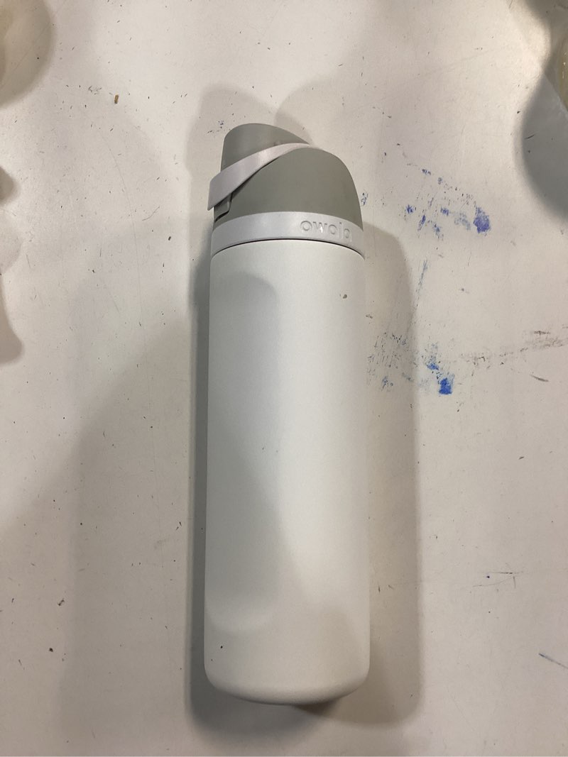 Condition photo showing As Is for Owala FreeSip Insulated Stainless Steel Water Bottle with Straw, BPA-Free Sports Water Bottle, Great for Travel, 24 Oz, Shy Marshmallow Shy Marshmallow 24 Ounces