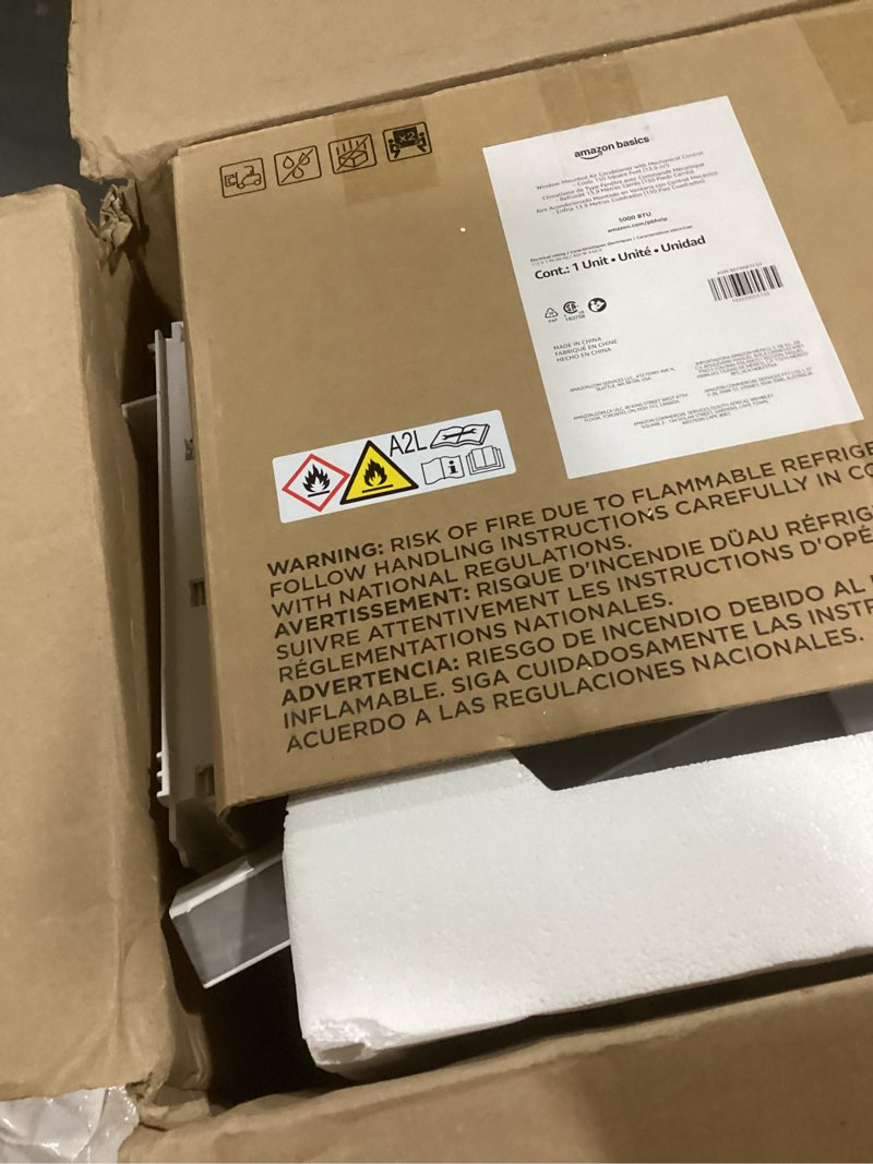 Condition photo showing As Is for amazon basics 5000-btu window air conditioner with quiet operation, up to 150 sqf, cool and fan functions, washable filter, adjustable window kit, intuitive mechanical controls, for small room, white white 5000 btu