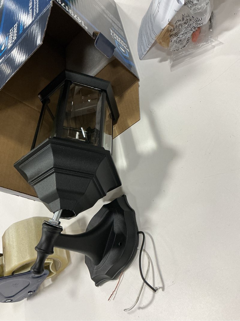 Condition photo showing As Is for Project Source 11.8” Wall Lantern. Clear Beveled Glass W/ Black Finish- 1479179