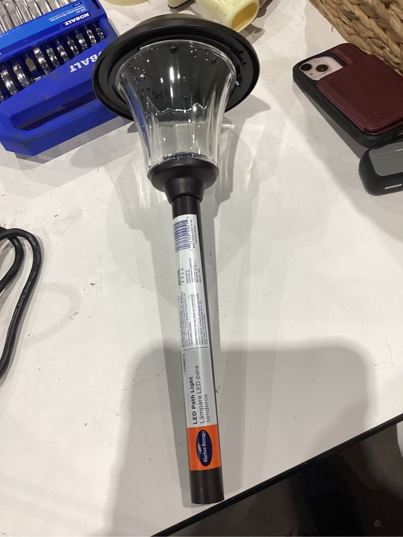 Condition photo showing As Is for harbor breeze 15 -lumens 0.15 -watt oil-rubbed bronze solar led outdoor path light ( 3000-k )