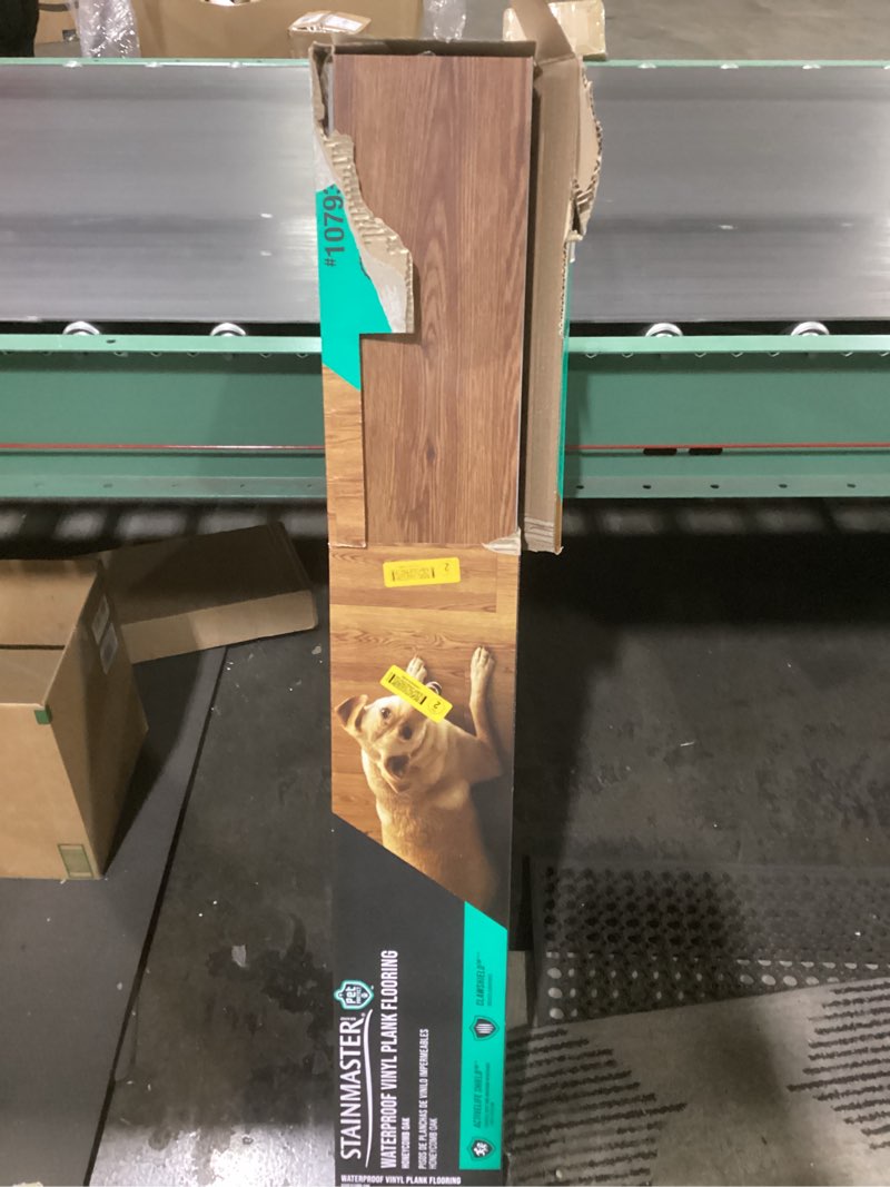 Condition photo showing As Is for STAINMASTER PetProtect Honeycomb 20-mil x 7-in W x 48-in L Waterproof Luxury Vinyl Plank Floorin