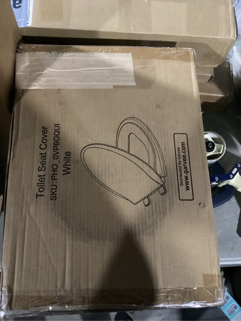 Condition photo showing New/Like New for toilet seat, elongated toilet seat with toddler seat built in, potty training toilet seat elongated fits both adult and child, with slow close and magnets- elongated