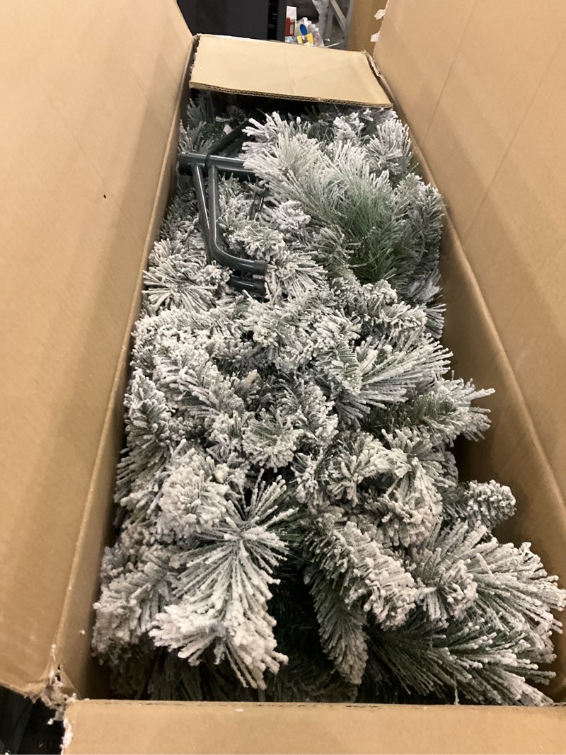 Condition photo showing Good Condition for Puleo International 7.5ft Pre-Lit Flocked Portland Pine Pencil Christmas Tree with 350 Clear Lights, 496 Realistic Dense Snow Flocked Branch Tips, Easy Setup Artificial Trees with Sturdy Metal Stand 7.5' Flocked Portland Pine 350 Clear Lights